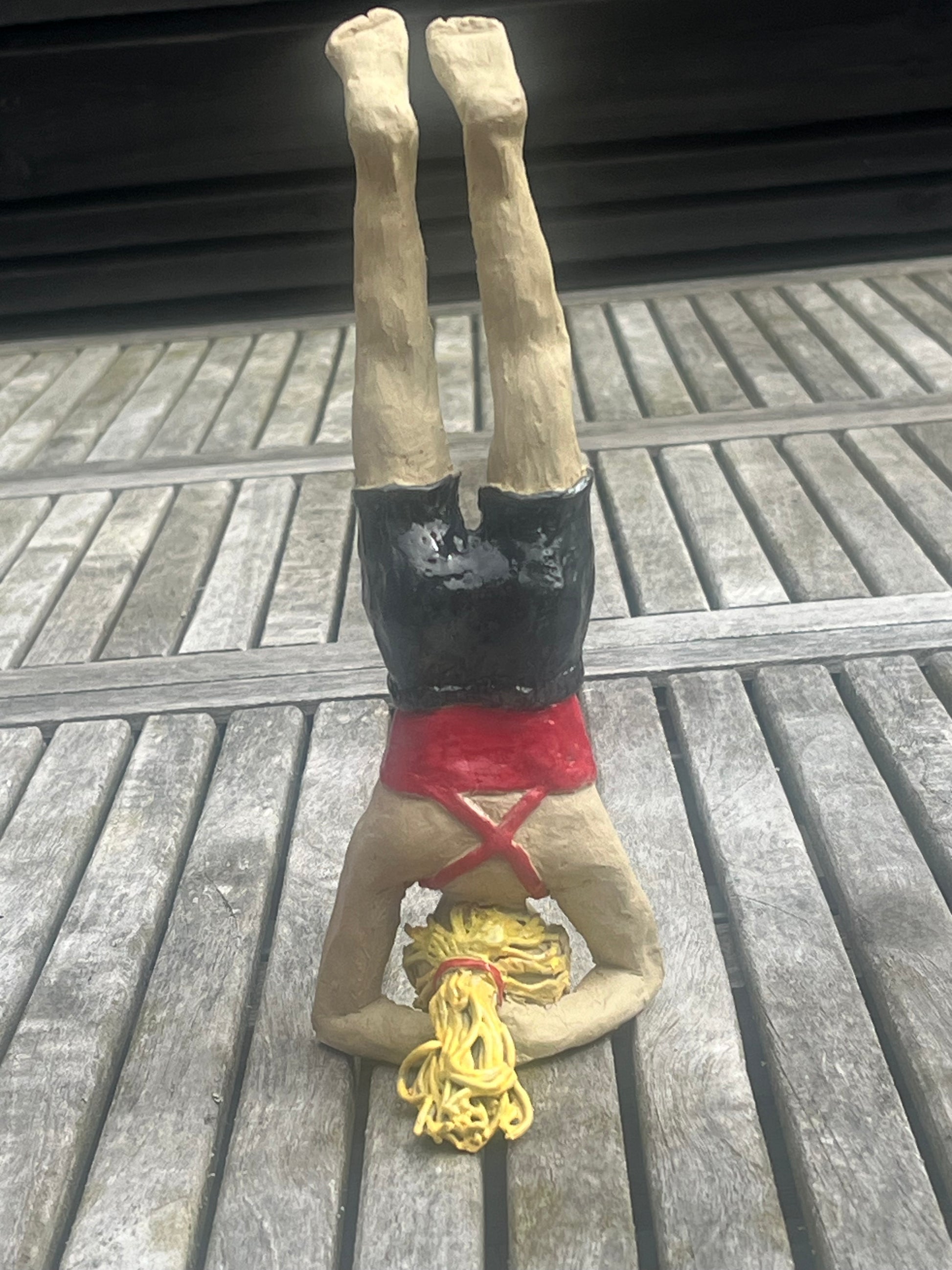 Yogatjej - huvudstående